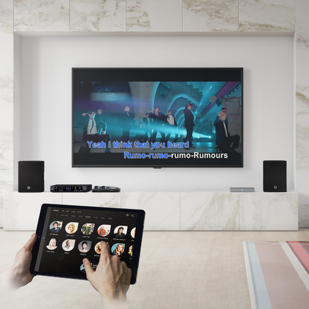 Luxury home theater setup with ISEE karaoke system and TV displaying lyrics